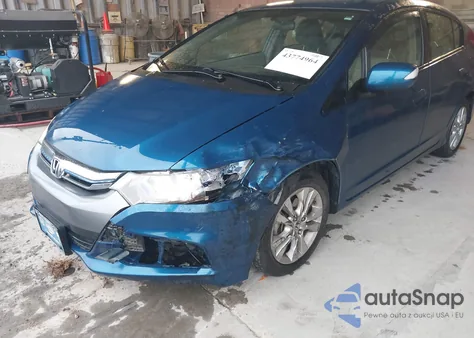 2013 Honda Insight Ex z USA, uszkodzony, nr VIN JHMZE2H71DS006453